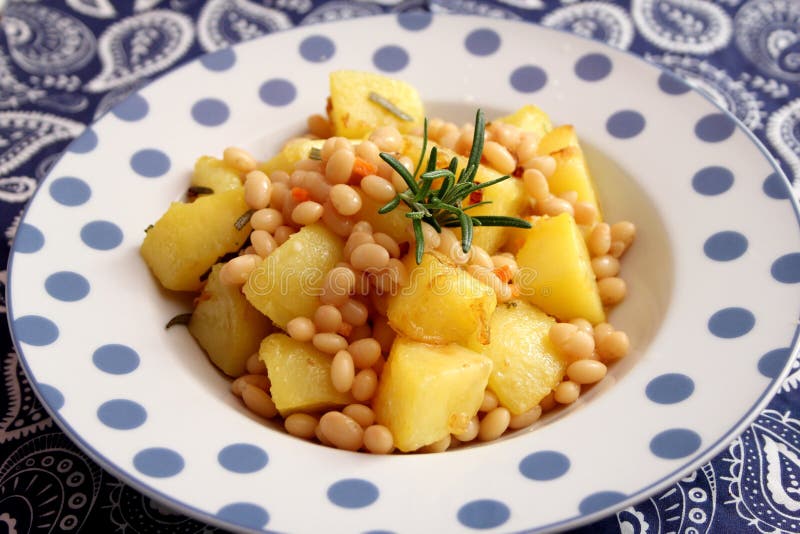 Fried potatoes with beans stock photo. Image of white 112611034