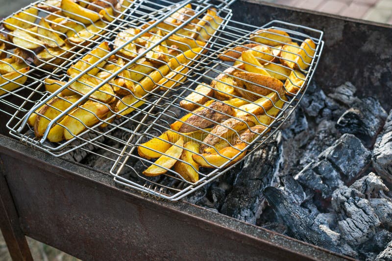 Fried Potatoes on Grill. Outdoors Barbecue Weekend. Stock Image Image