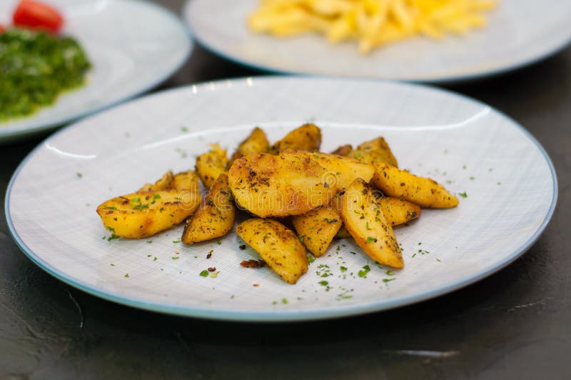 Fried Potatoes with Spices. Vegetarian Food Side Dish or Appetizer