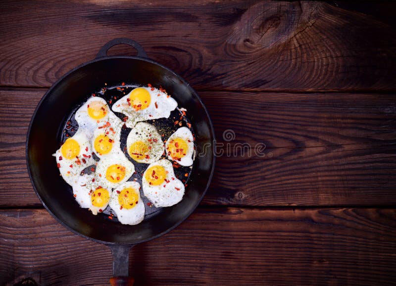 Fried Quail Eggs in a Black Castiron Frying Pan Stock Image Image of