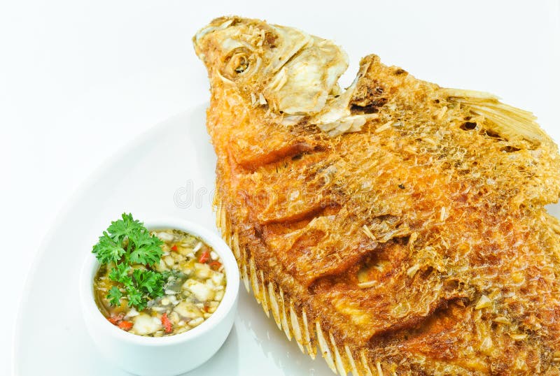 Fried red tilapia fish stock image. Image of food, brown 30763433