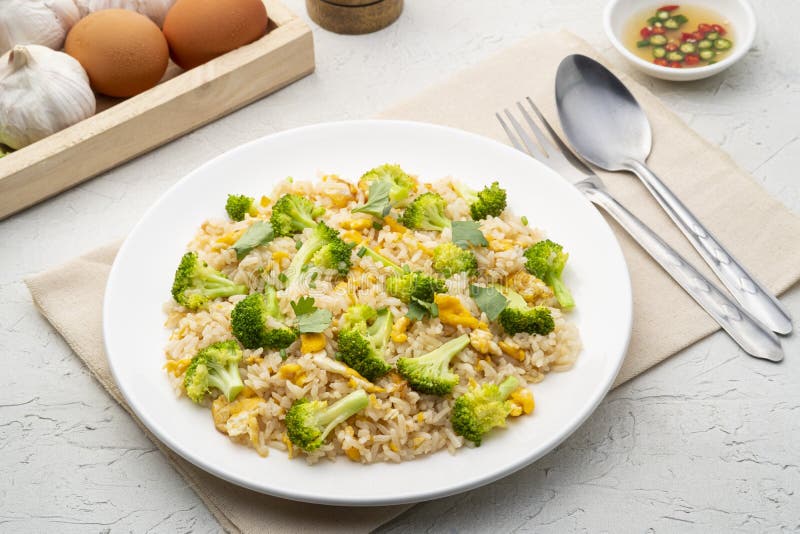 Fried Rice with Broccoli and Egg in White Plate Stock Photo - Image of