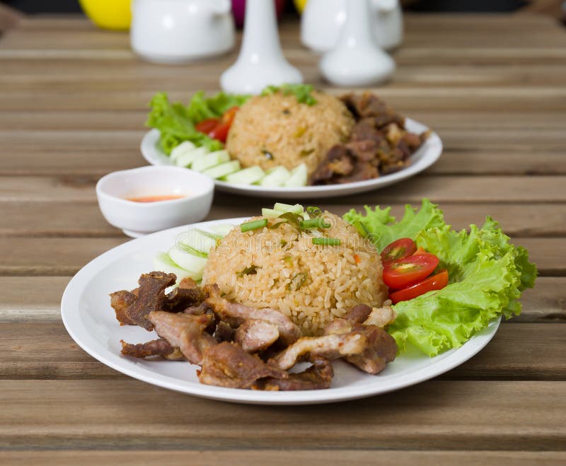 Fried rice with fried pork stock image. Image of green 39816983