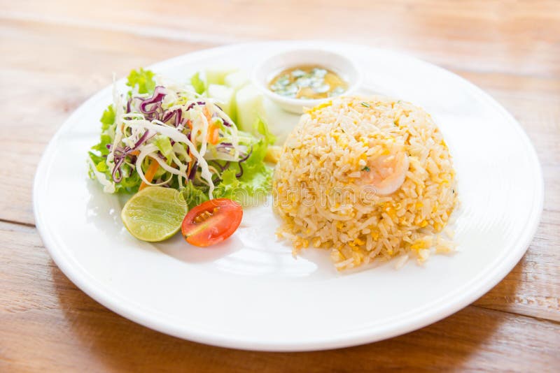 Fried rice with shrimp and salad