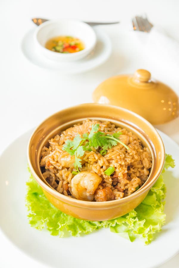 Fried Rice with Shrimp and Sausage in Clay Pot Stock Photo - Image of