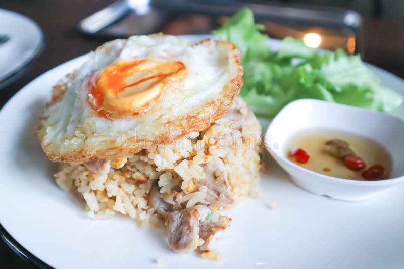 Fried Rice or Stir Fried Rice with Pork and Sunny Side Up Egg Stock