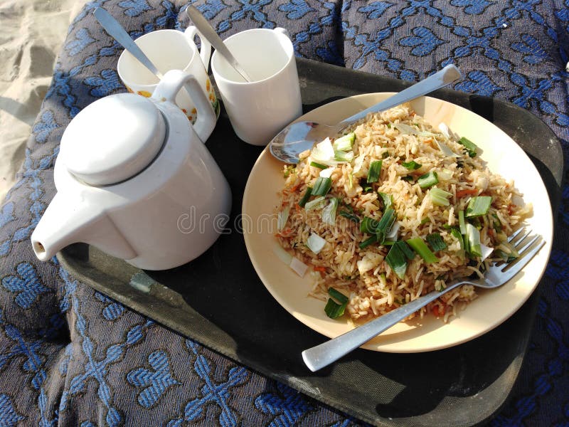 Fried rice and tea beach food Indian cuisine stock image Fried rice and tea beach food Indian cuisine stock image