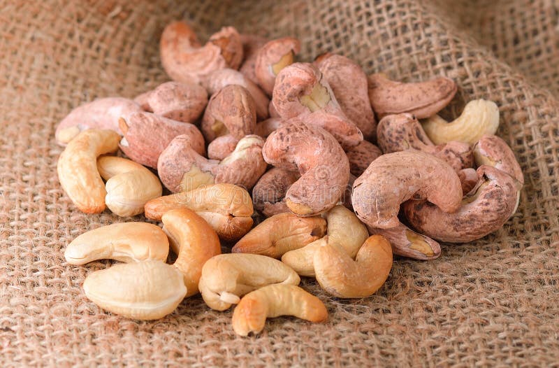 Fried Roasted Cashew Nuts on Wooden Background Stock Photo - Image of