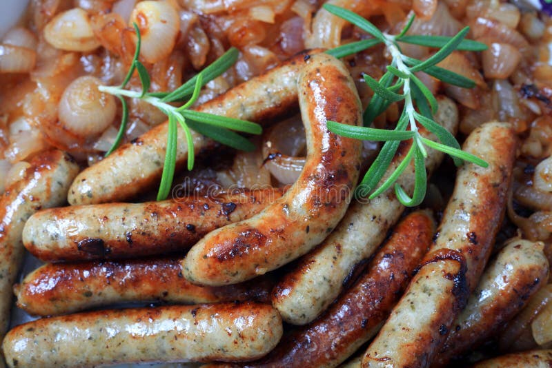 Fried sausage and onions stock image. Image of nurenberger 10368471