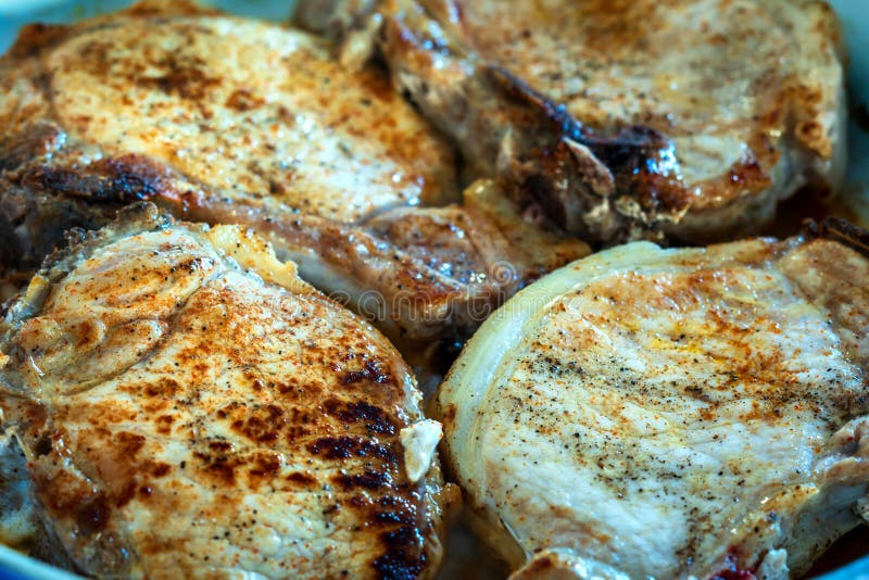 Fried Seasoned Pork Chops Closeup Stock Photo Image of bone, cooking