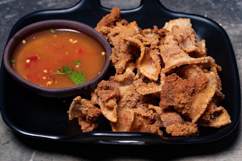 Fried Sliced Pork with Fish Sauce and Spicy Sauce Stock Photo Image