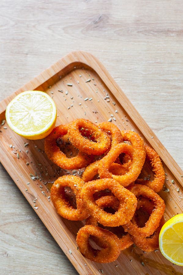 Fried Squid Rings Breaded With Lemon Stock Photo - Image of fish ...