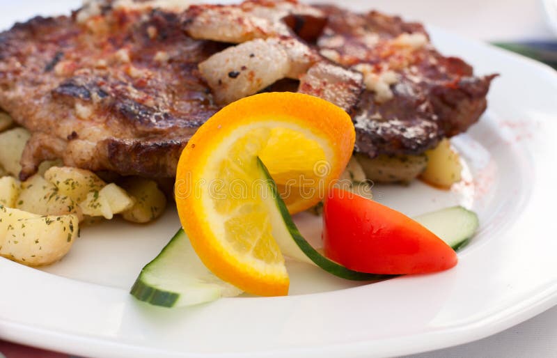 Fried steak with potatos