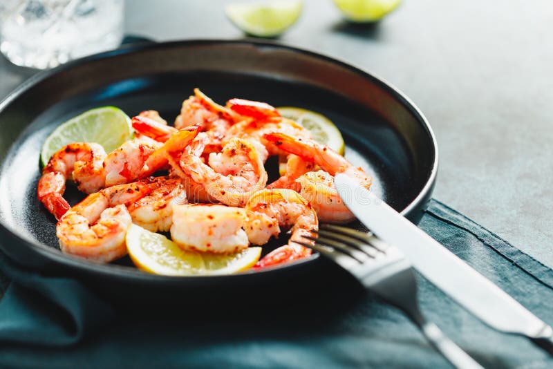 Fried Tiger Shrimp with Lime Stock Photo - Image of plate, black: 185747236