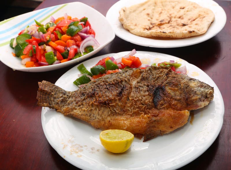 Fried Tilapia Fish Meal , Mixed Salad ,bread Stock Image Image of