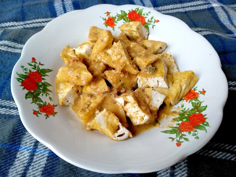 Fried Tofu on the Plate. Traditional Indonesian Culinary Food Stock