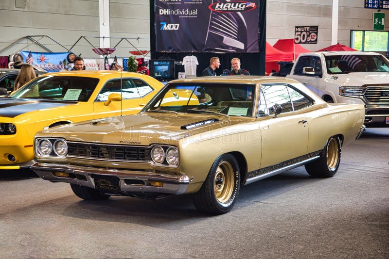 FRIEDRICHSHAFEN - MAY 2019: golden sand PLYMOUTH ROAD RUNNER 1968 at Motorworld Classics Bodensee on May 11, 2019 in