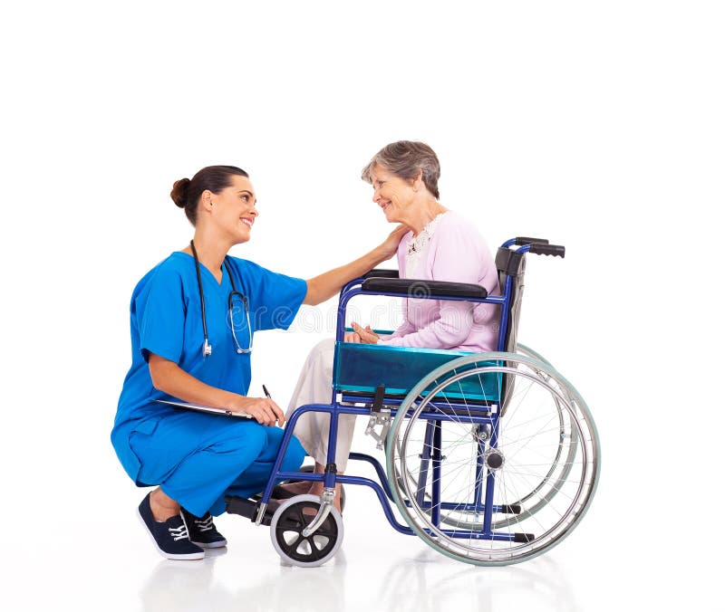 Friendly nurse talking to disabled senior patient. Friendly nurse talking to disabled senior patient