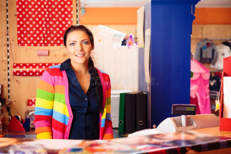 Friendly Sales Person at Children`s Store Stock Image - Image of pink ...