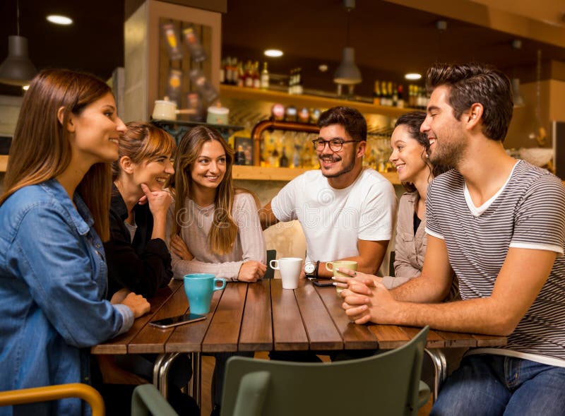Friends at the cafe stock image. Image of beverage, meeting 124604461
