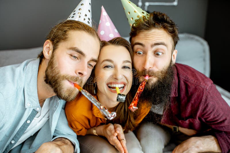 Friends celebrating at home stock photos Friends celebrating at home stock photos