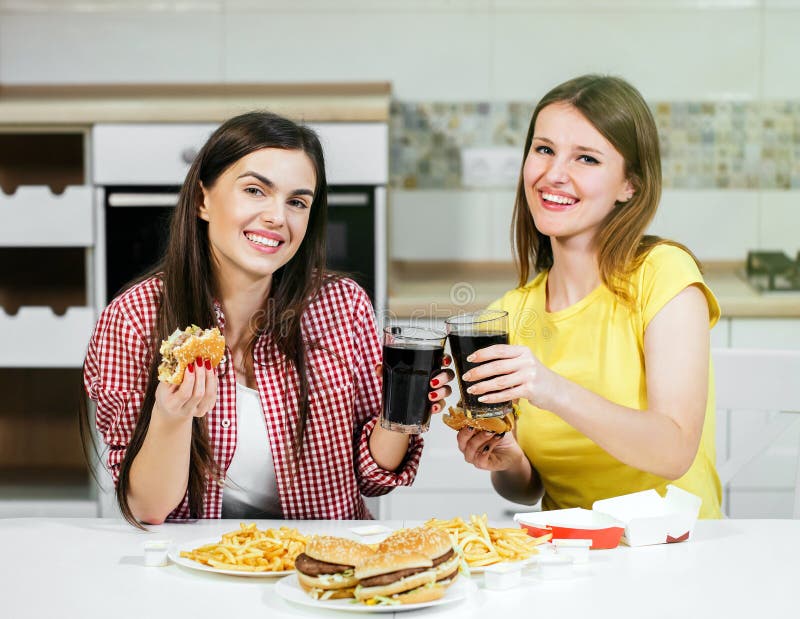 Friends Eat Fast Food stock image. Image of cola, happiness - 111420281