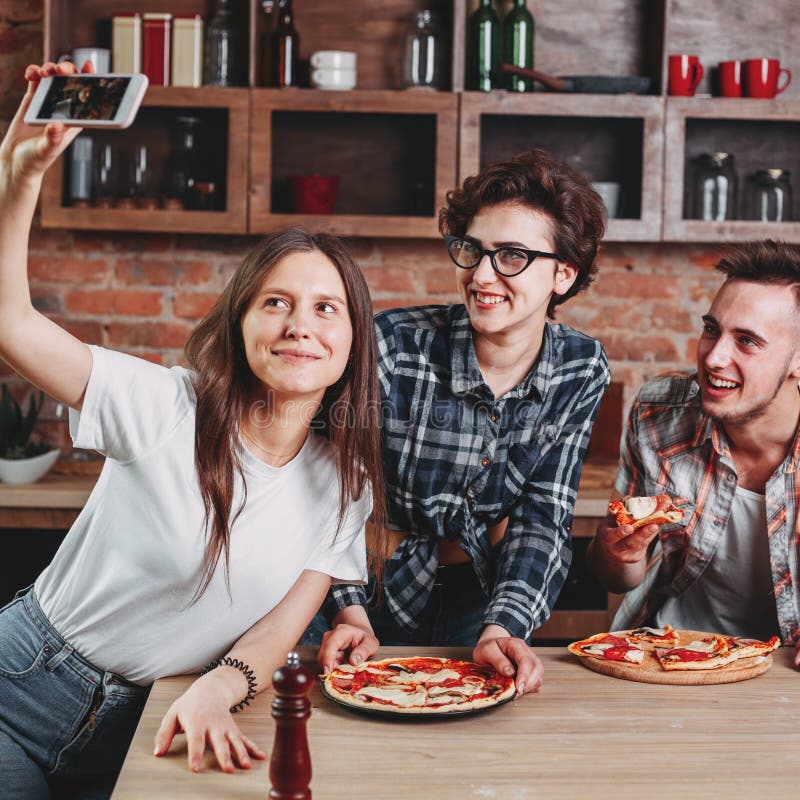 close-up image, A group of friends eating pizza in the party together. New  year party, Birthday party, Pizza party at home Stock Photo - Alamy