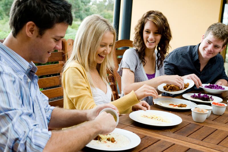 Friends Having Dinner stock image. Image of table, people - 7498379