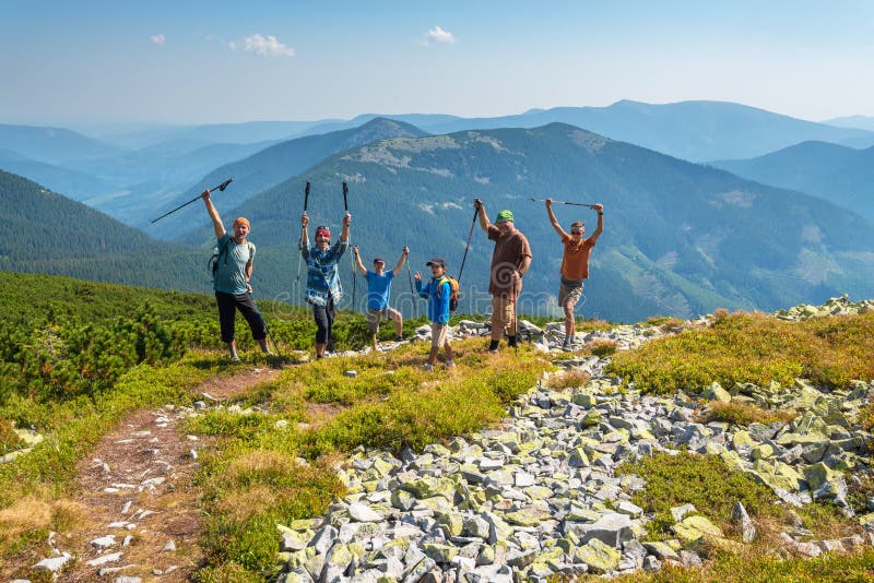 Friends having fun during a travel in mountains royalty free stock image Friends having fun during a travel in mountains royalty free stock image