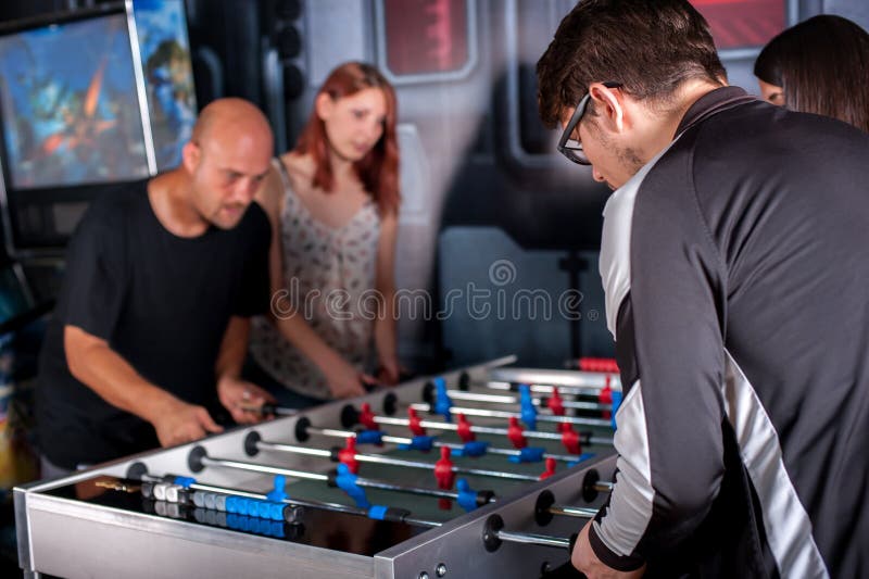 Friends Playing Table Foosball Stock Photo Image of cheerful, female 79043126