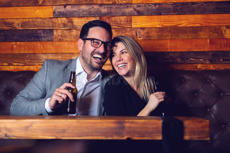Friends in the Pub. Drinking beer, talking, having fun. stock photography Friends in the Pub. Drinking beer, talking, having fun. stock photography