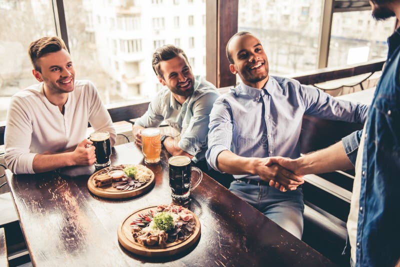 Friends in pub stock photos Friends in pub stock photos