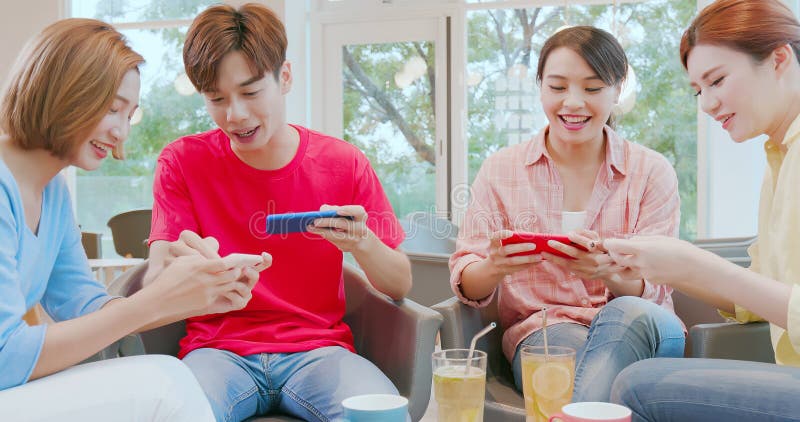 Friends share interesting games stock photos