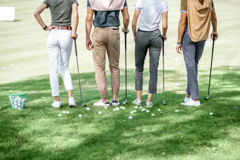 People Playing Golf Outdoors Stock Photo - Image of putting ...