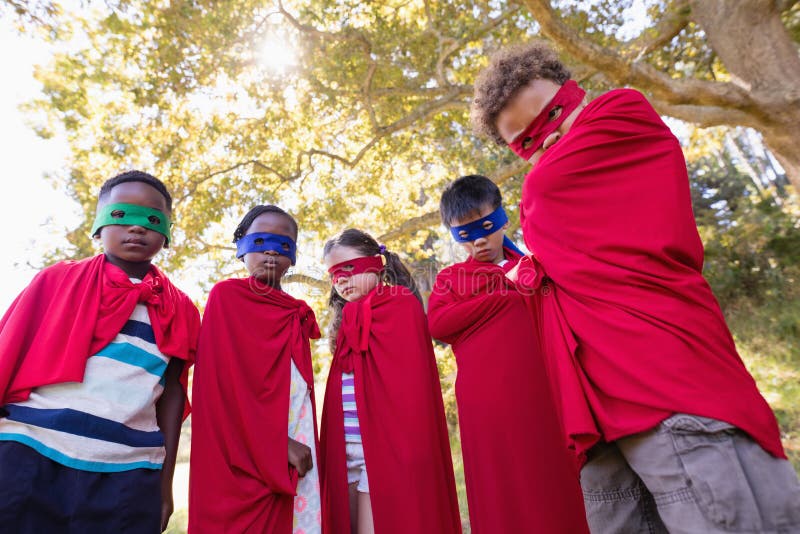 Friends in Superhero Costumes Standing at Campsite Stock Photo Image of happy, camp 91784626
