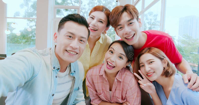 Friends take selfie happily stock photos