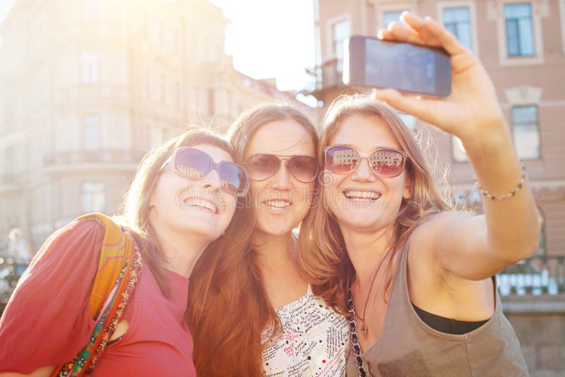 Friends taking selfy, students travel to Europe, girls selfie stock photography Friends taking selfy, students travel to Europe, girls selfie stock photography
