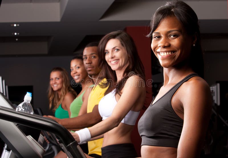 Friends on treadmills stock photography