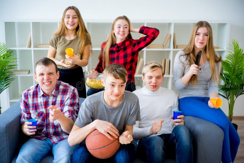 Friends Watching Sports on TV Stock Image Image of excited, german