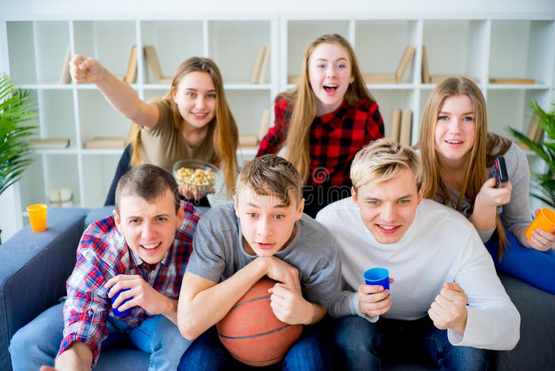 Friends Watching Sports on TV Stock Image Image of excited, german
