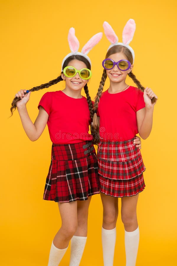 Friendship concept. funny girls with eggs. family preparing for Easter. kids having fun. Sisters celebrate easter. best royalty free stock images Friendship concept. funny girls with eggs. family preparing for Easter. kids having fun. Sisters celebrate easter. best royalty free stock images