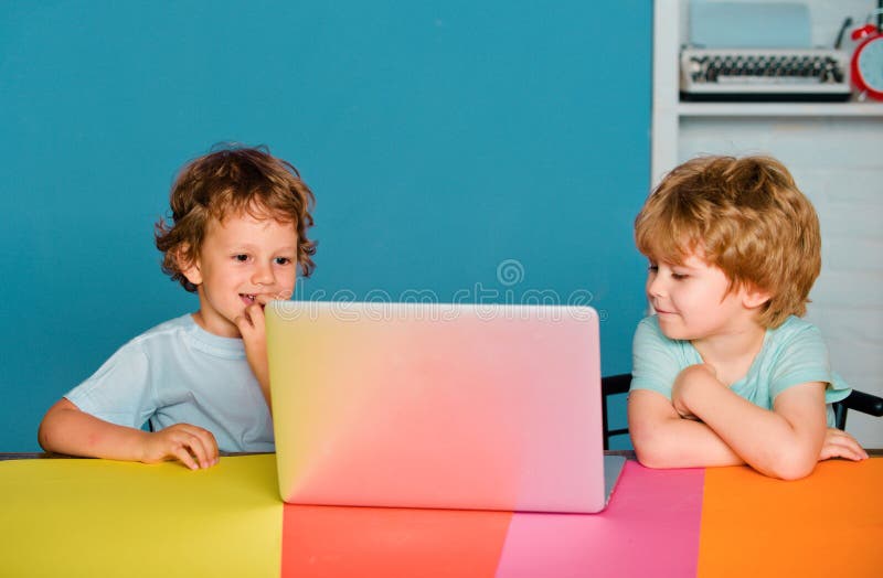 Friendship and friend in school. Child from elementary school with book and bag. Boys Pupils from elementary school at royalty free stock photo