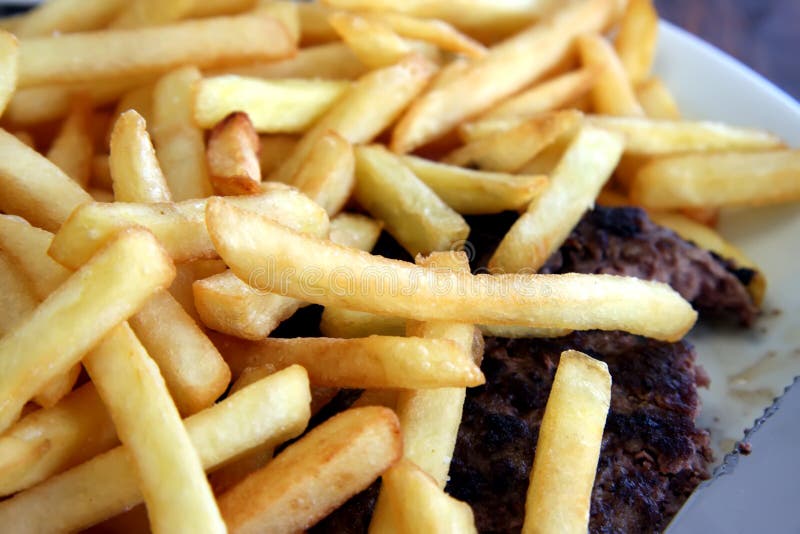 Fries on meat stock image. Image of meat, frenchfries 4160881