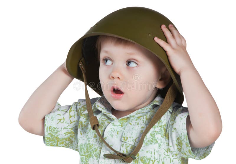 Frightened boy with army helmet isolated on white