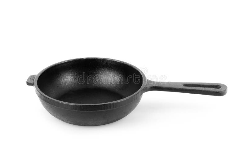 Frigideiras do ferro fundido isoladas no branco foto de stock Frigideiras do ferro fundido isoladas no branco foto de stock