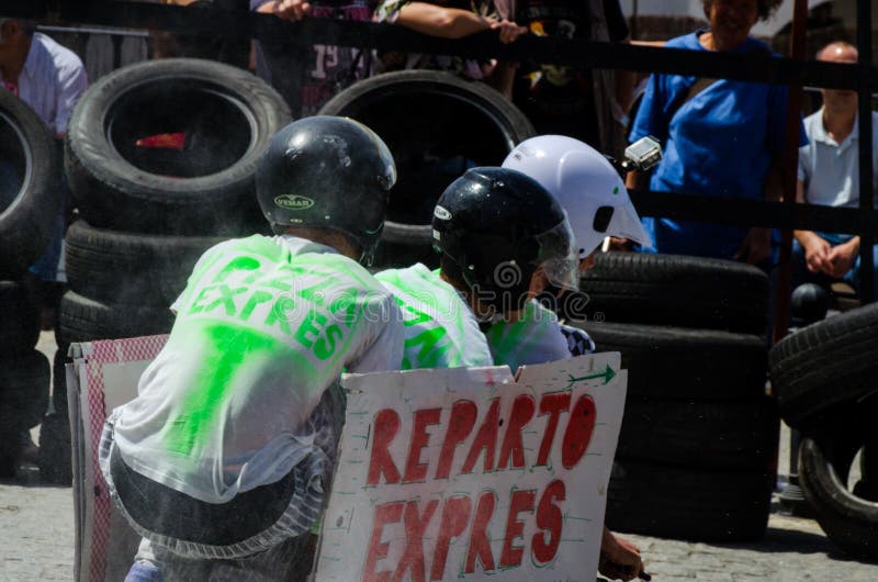 FRIGILIANA, SPAIN - MAY 13, 2018 `Autos Locos` - traditional fun involving the ride of cardboard cars in small spanish town royalty free stock photo FRIGILIANA, SPAIN - MAY 13, 2018 `Autos Locos` - traditional fun involving the ride of cardboard cars in small spanish town royalty free stock photo