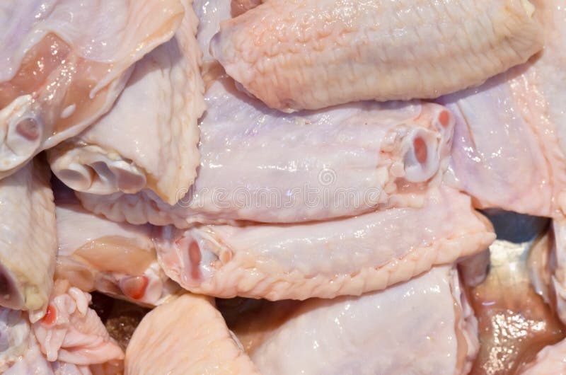 Frische gekühlte Hühnerflügel stockbild Frische gekühlte Hühnerflügel stockbild