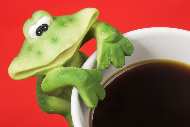 Frog and cup of coffee