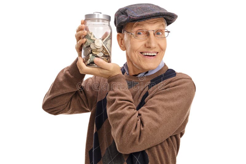 Froher älterer Mann, der ein Glas mit Geld hält lizenzfreies stockfoto