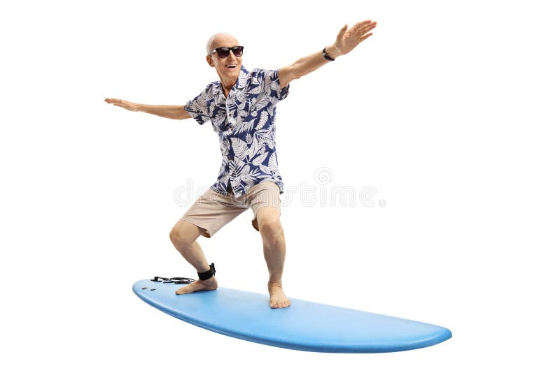 Froher älterer surfender Mann stockbild